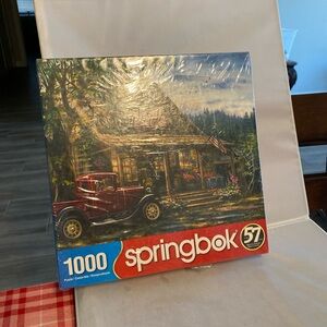1000-Piece Puzzle - Rustic Cabin with Red Car